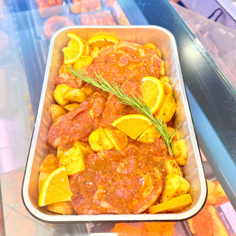 Boneless neck steaks in mustard sauce with thyme and lemon